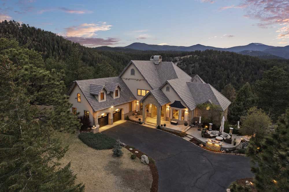 Aerial Drone image of a luxury real state listing in Colorado at twilight