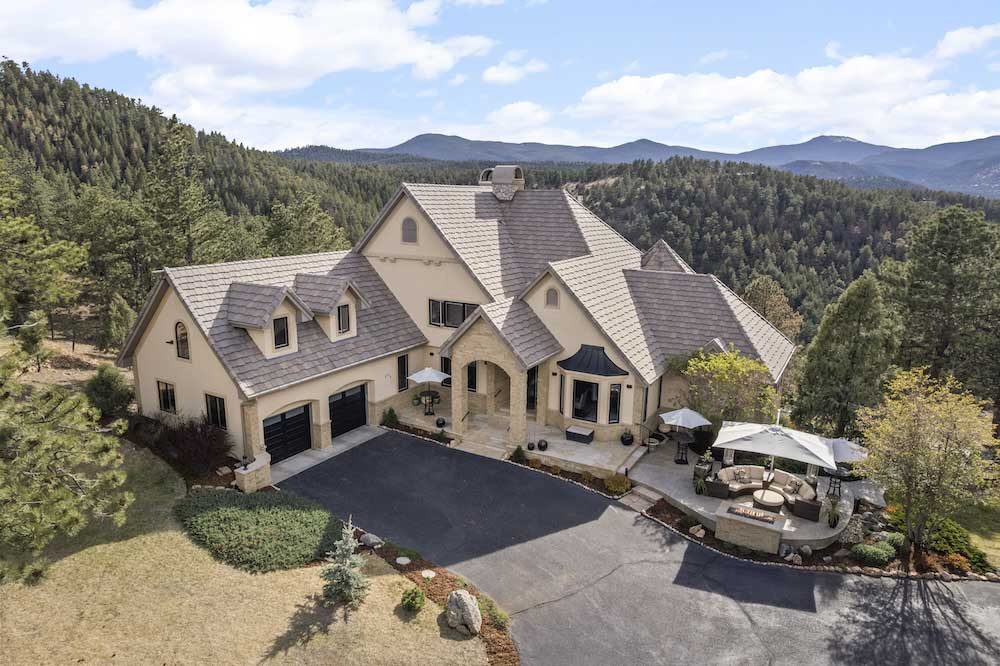 Aerial Drone image of a luxury real state listing in Colorado at twilight